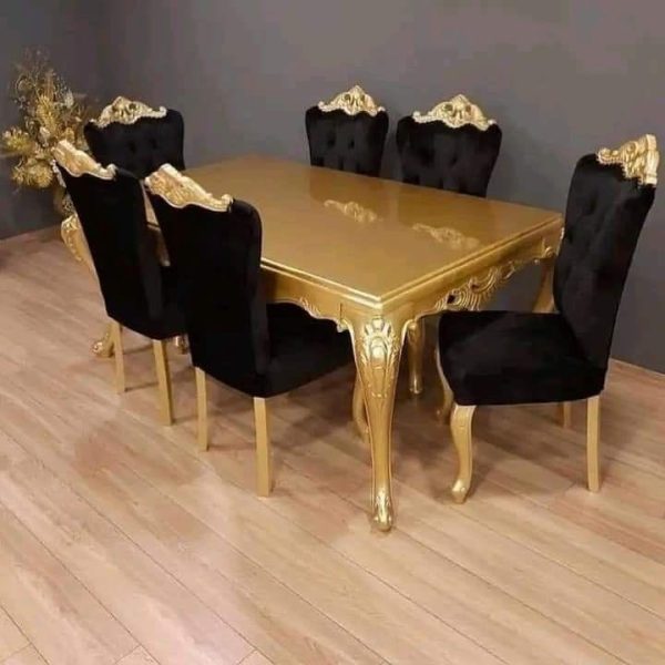 Dining table with velvet poshing chairs